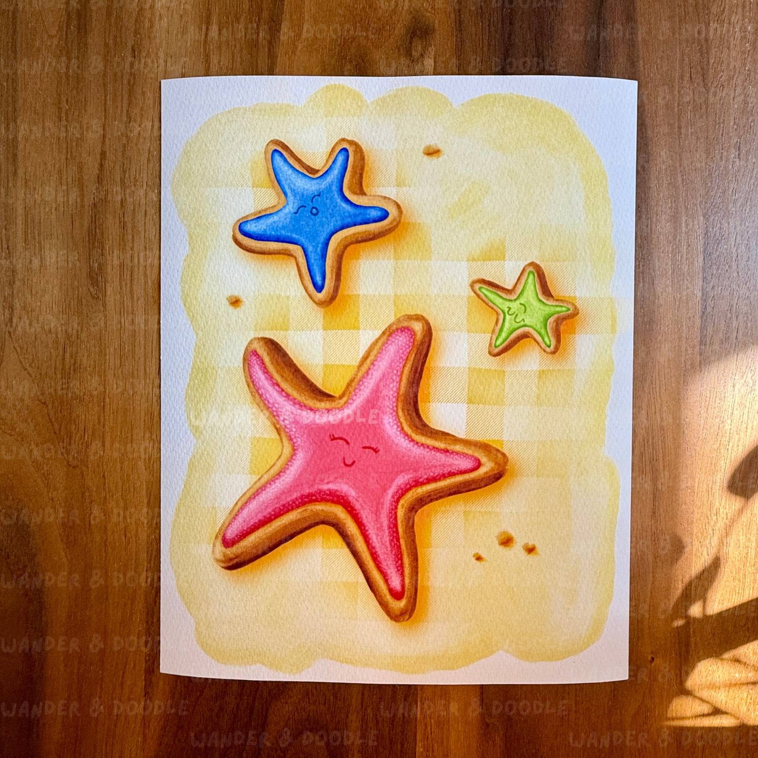 Colorful star-shaped sugar cookie illustration on a wooden surface