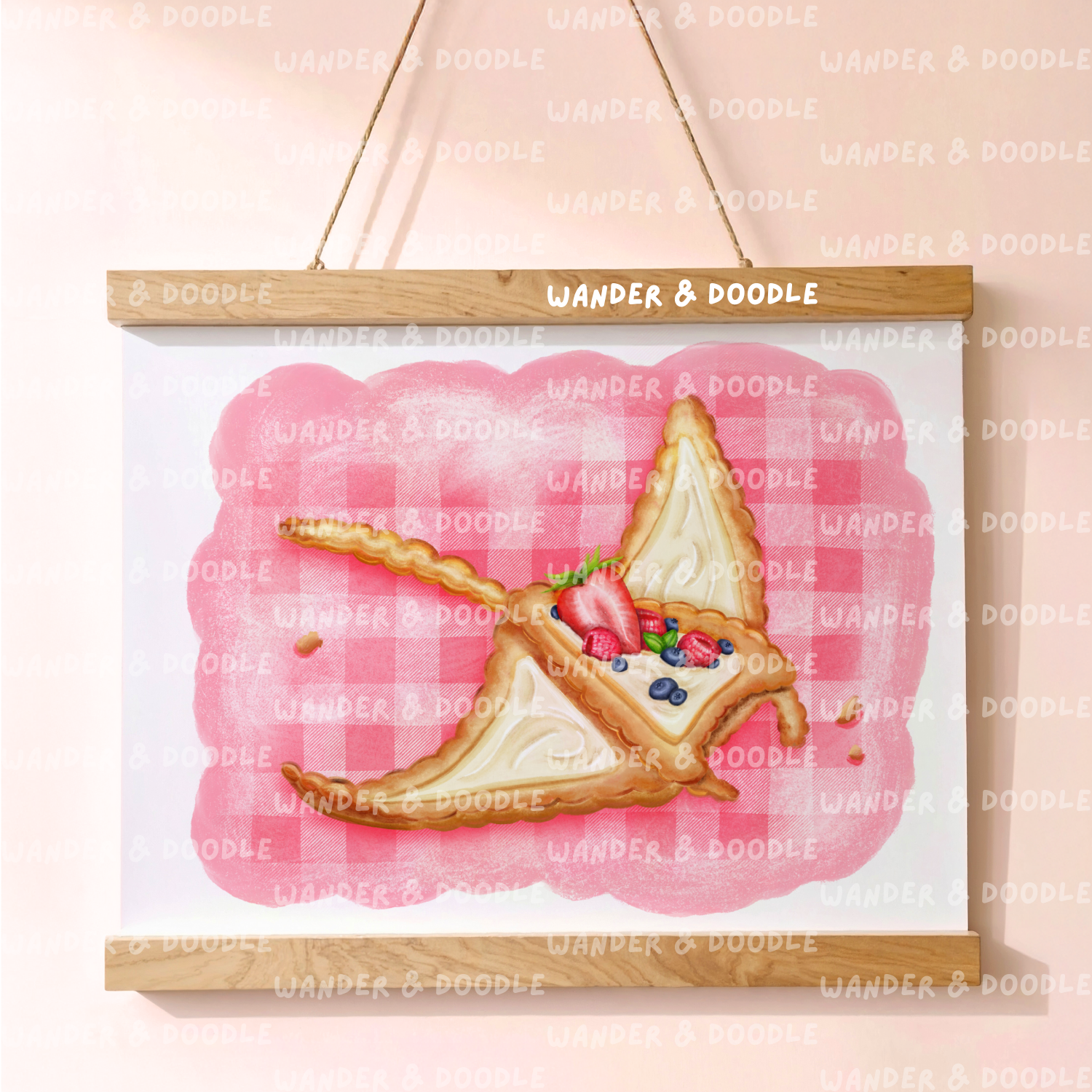 Illustration of a fruit tart in the shape of a manta ray with strawberry and blueberries on a pink checkered background, branded 'Wander & Doodle'.